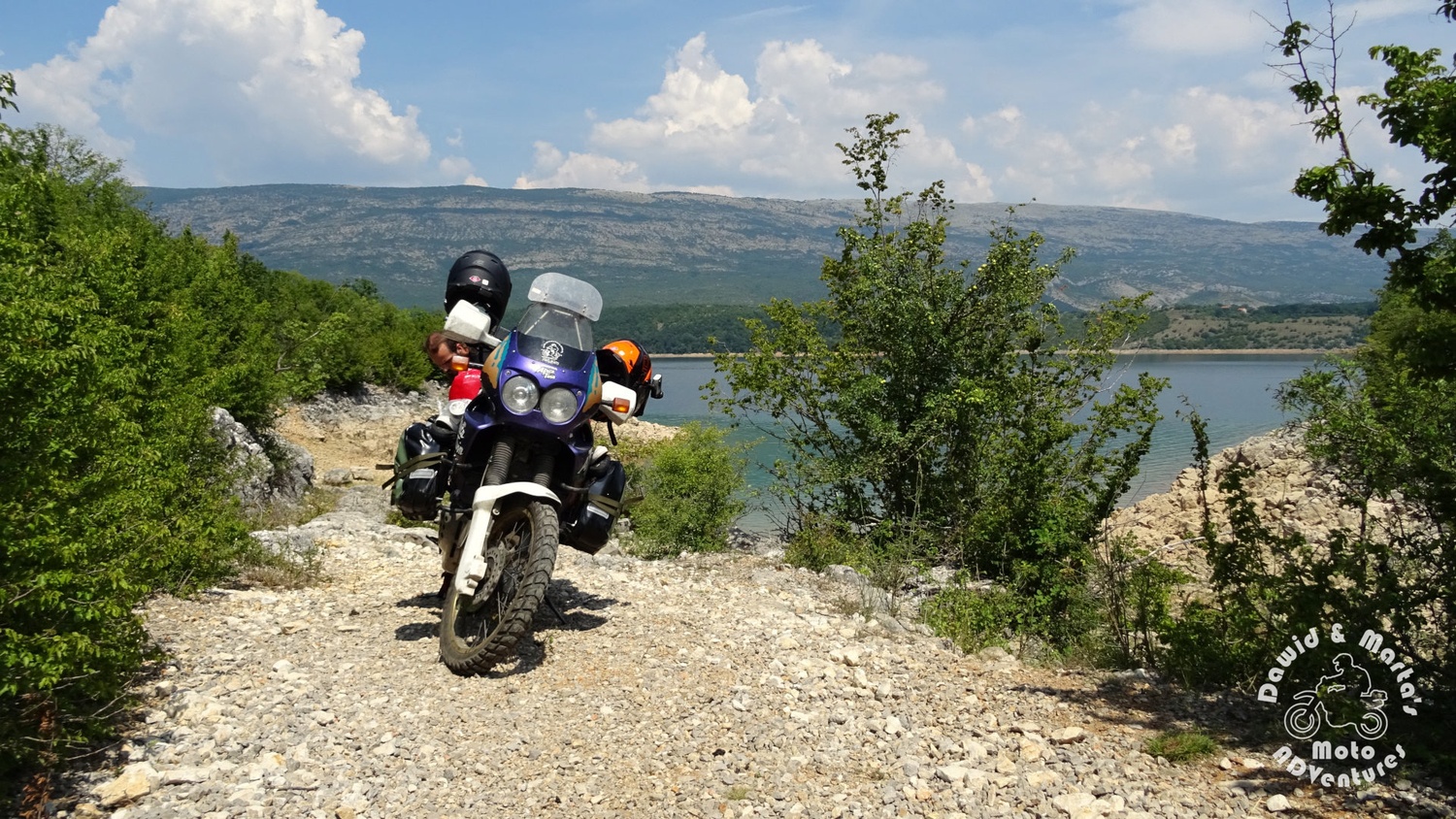 View on the Peruca Lake with Africa Twin in the foreground