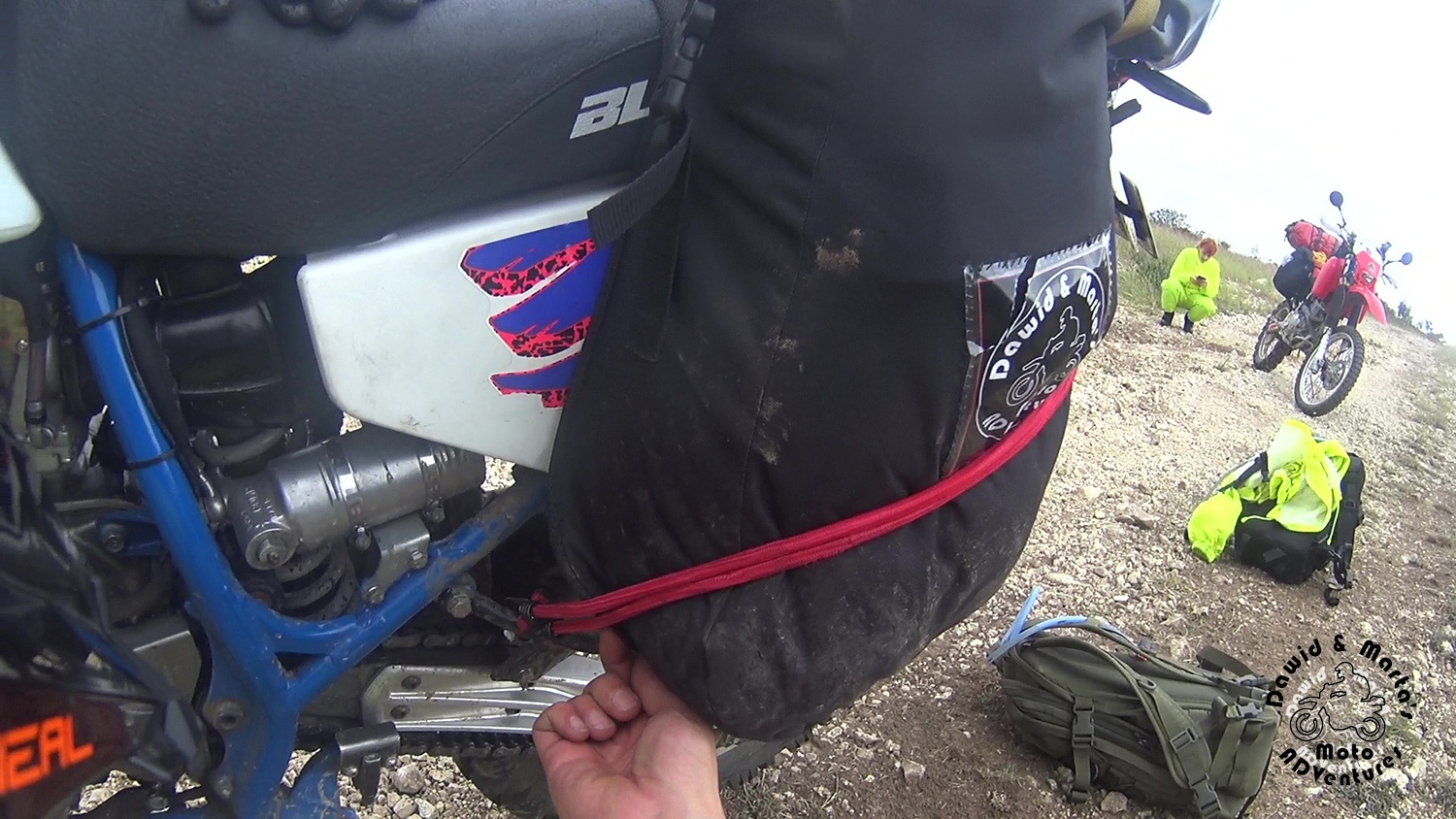Saving the bike's side bag with spare ropes