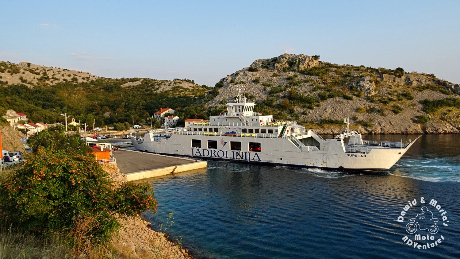 The ferry cruising from Prizna to the Pag Island anchoring in Prizna