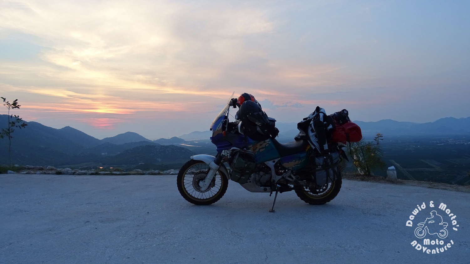 Lookout point at the fruit store in the Neretva River delta with Africa Twin motorbike in the foreground